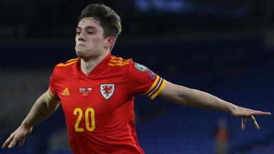 Daniel James celebrates