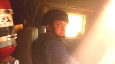 The BBC's Quentin Sommerville in a Humvee under attack