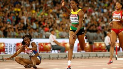 Tiffany Porter falls on the line as Danielle Williams