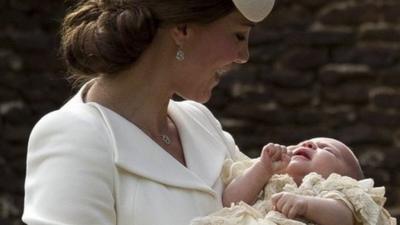 Duchess of Cambridge holding Princess Charlotte