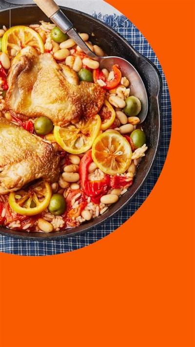 Chicken, olives, lemons and rice dish, viewed from above 