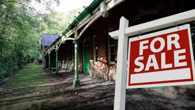 Chapeltown station with a for sale sign