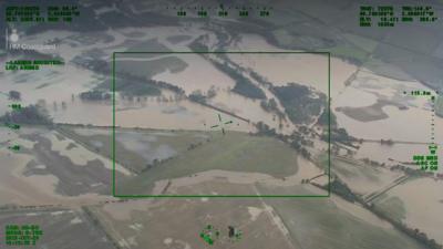 Houses, fields and roads in and around the Angus town of Brechin can be seen submerged in water.