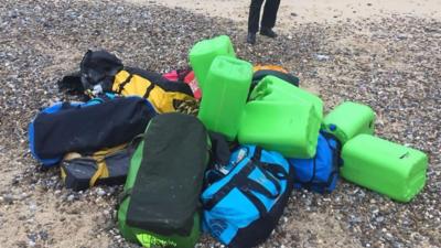 The National Crime Agency is carrying out an investigation to trace the owners of holdall bags washed up on two Norfolk beaches containing £50m-worth of cocaine.