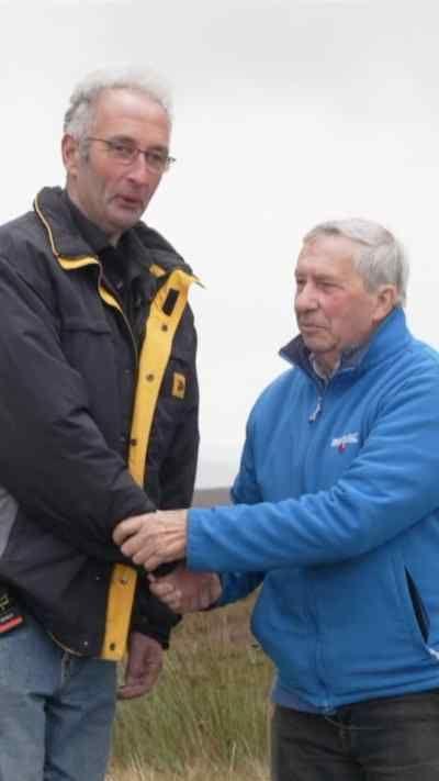 Two men shaking hands