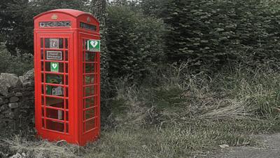 Mock-up phone box with defibrillator sign