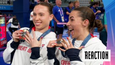 Mew Jensen & Harper holding their bronze medals 