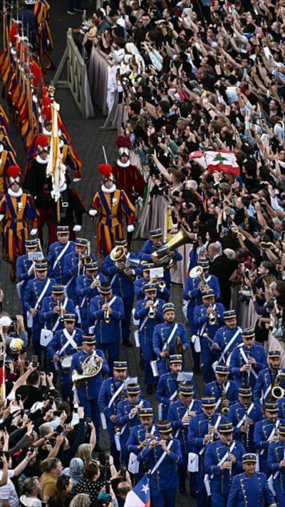 Marching band walking among crowd