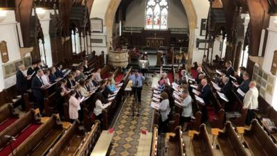 The King William's College choir recording the hymn