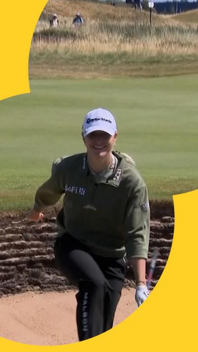 Charley Hull walking out the bunker after Chipping in