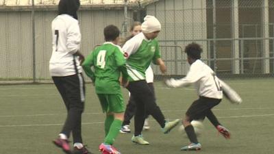 Children playing football