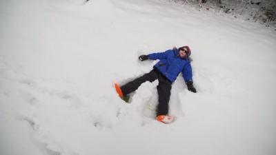 A child lying in the snow