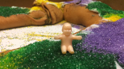 Plastic baby on a king cake