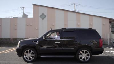 The BBC's Rupert Wingfield Hayes driving a Jeep car