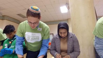 Volunteers cooking