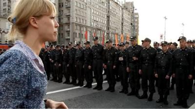 Maria Baronova confronting riot police in 2012