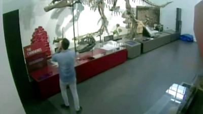 Man with dinosaur bones