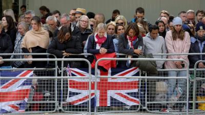 Crowds in London fall silent at the Queen's funeral