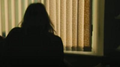 The silhouette of a woman who escaped an abusive relationship