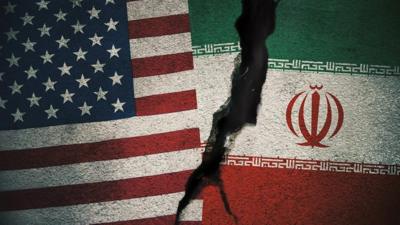 US and Iranian flags