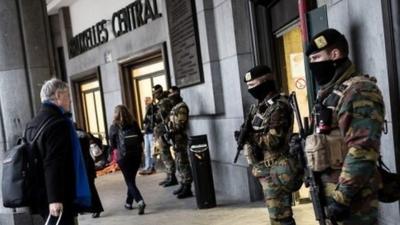 Belgian Army soldiers patrol outside Central Station in Brussels