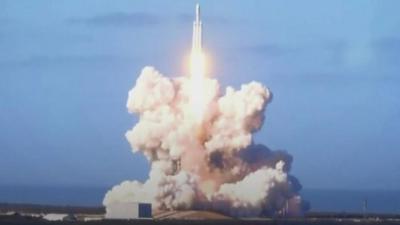 SpaceX launches world's most powerful rocket.