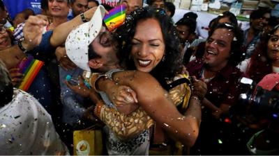 People celebrate as the ruling is announced