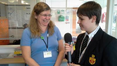 Kelsey with one of his teachers