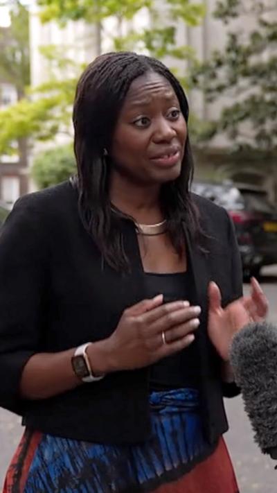 Miatta Fahnbulleh being intervewed outside on a street in London