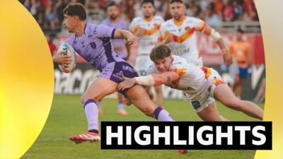 Arthur Mourgue of Hull KR evades Denive Balmforth of Catalans