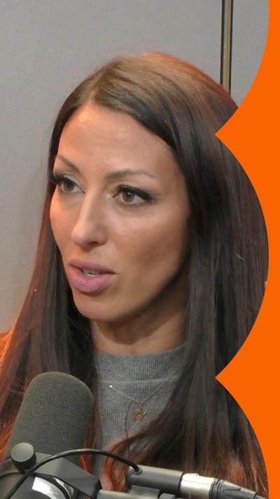 Screengrab of Sabrina speaking into a microphone