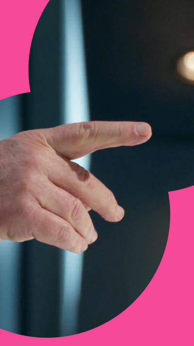 Hand on-screen with finger pointing towards the right