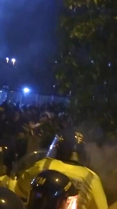 police clash with crowd of football fans