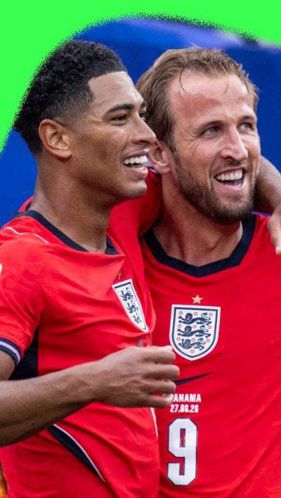 Harry Kane and Jude Bellingham celebrating a goal for England against Panama. They are both wearing red England shirts.