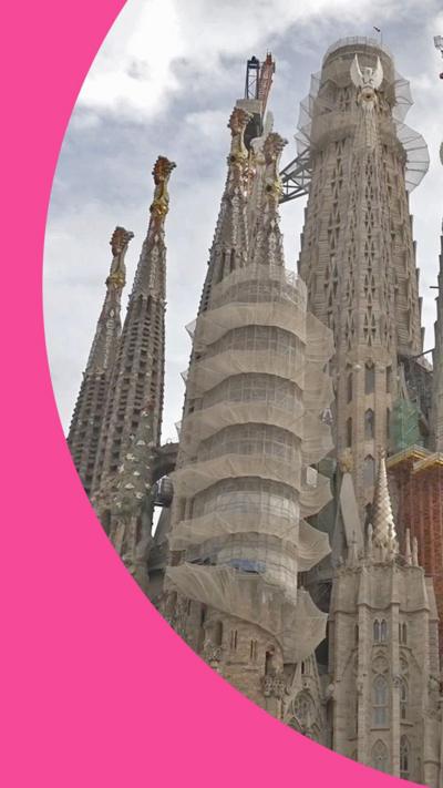 The spires of the Sagrada Familia in Barcelona, viewed from outside.