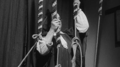 Mrs Martindale uses ropes to ring four church bells at the same time