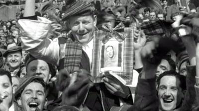 Scottish football fans celebrating.