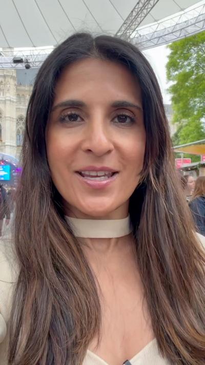 Nomia Iqbal looks at the camera and smiles. 