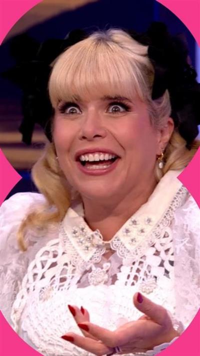 Paloma Faith wearing a white dress on the set of The One Show