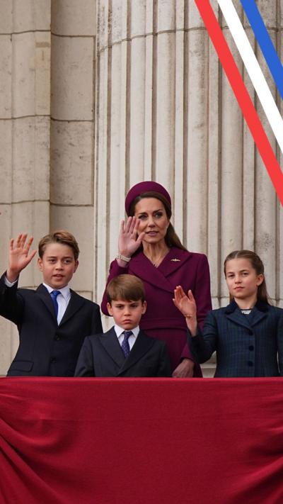 Princes George and Louis, Princess Charlotte and Catherine on the balcony after the flypast