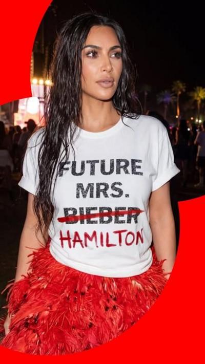 Kim Kardashian in an AI generated t-shirt which reads "Future Mrs Bieber". "Bieber" is crossed out and "Hamilton" is below.