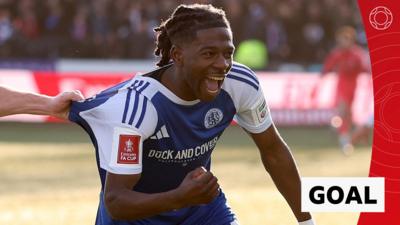Isaac Buckley-Ricketts celebrates in Macclesfield kit