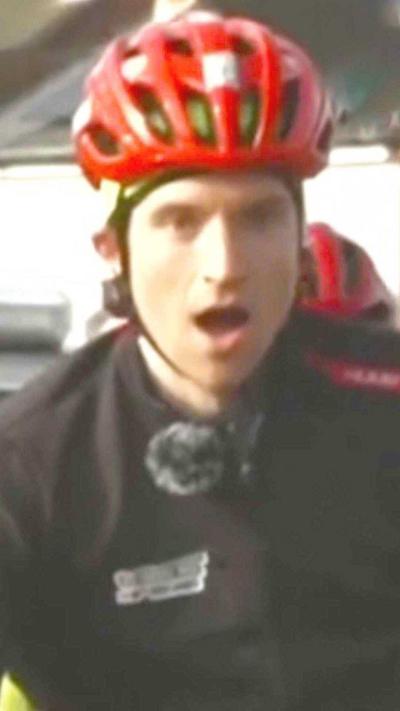 Greg James looking shocked on his bike.