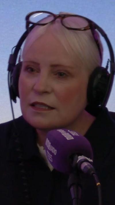 Sam Garside - Middlesbrough Council's Environmental Sustainability Manager. She has blonde hair tied back and is in the radio studio talking into a microphone and wearing headphones.