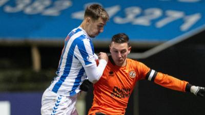 Kilmarnock's Brad Lyons and Dundee United's David Babunksi