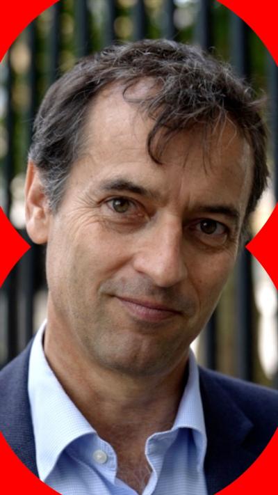 Correspondent Damian Grammaticas wearing a blue suit. He has short brown hair 