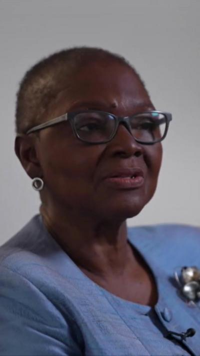 Baroness Amos wearing a blue jacket