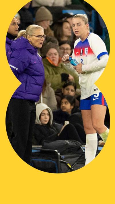England manager Sarina Wiegman converses with Alessia Russo
