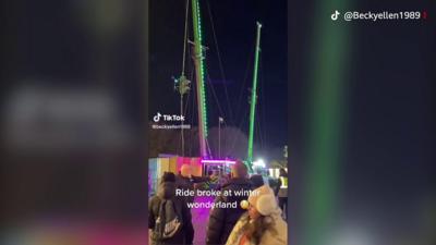 Boys trapped in cage at bungee ride