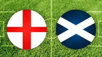 england and scotland flag on green pitch